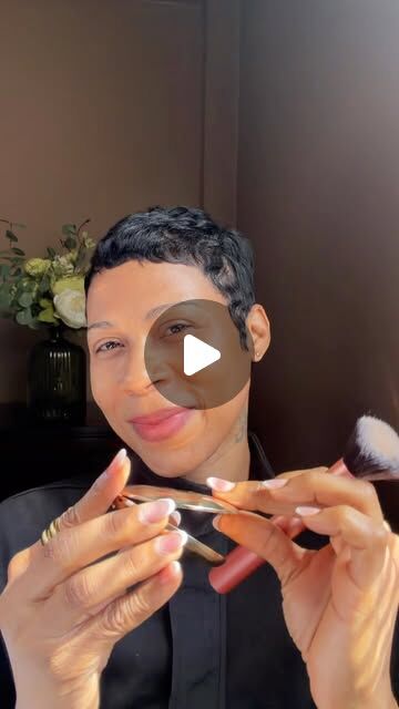 Chaniel applying Charlotte Tilbury powder with a brush